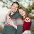 Texas wedding photographer posing outdoors with family members for a relaxed portrait.